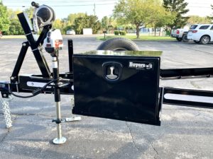 Trailer with a painted toolbox